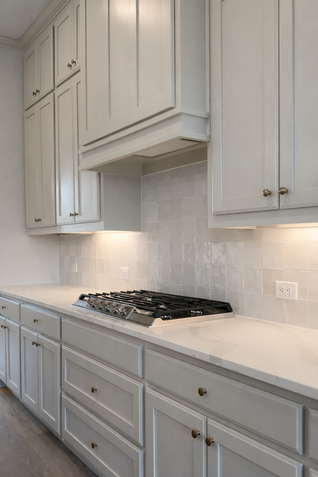 Kitchen detail with custom cabinetry and tile backsplash